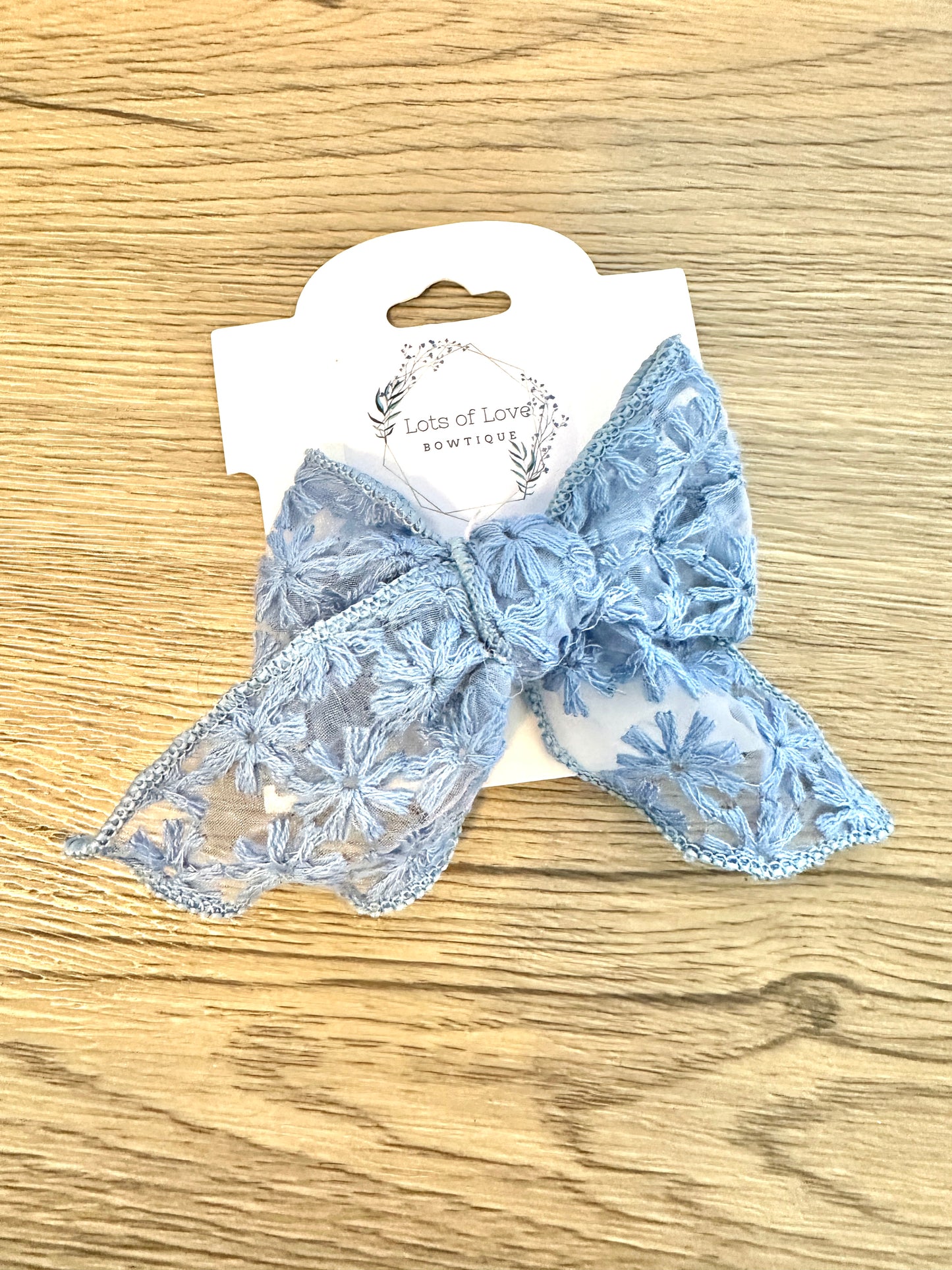 Sheer Dark Blue Daisy Hand Tied Bow
