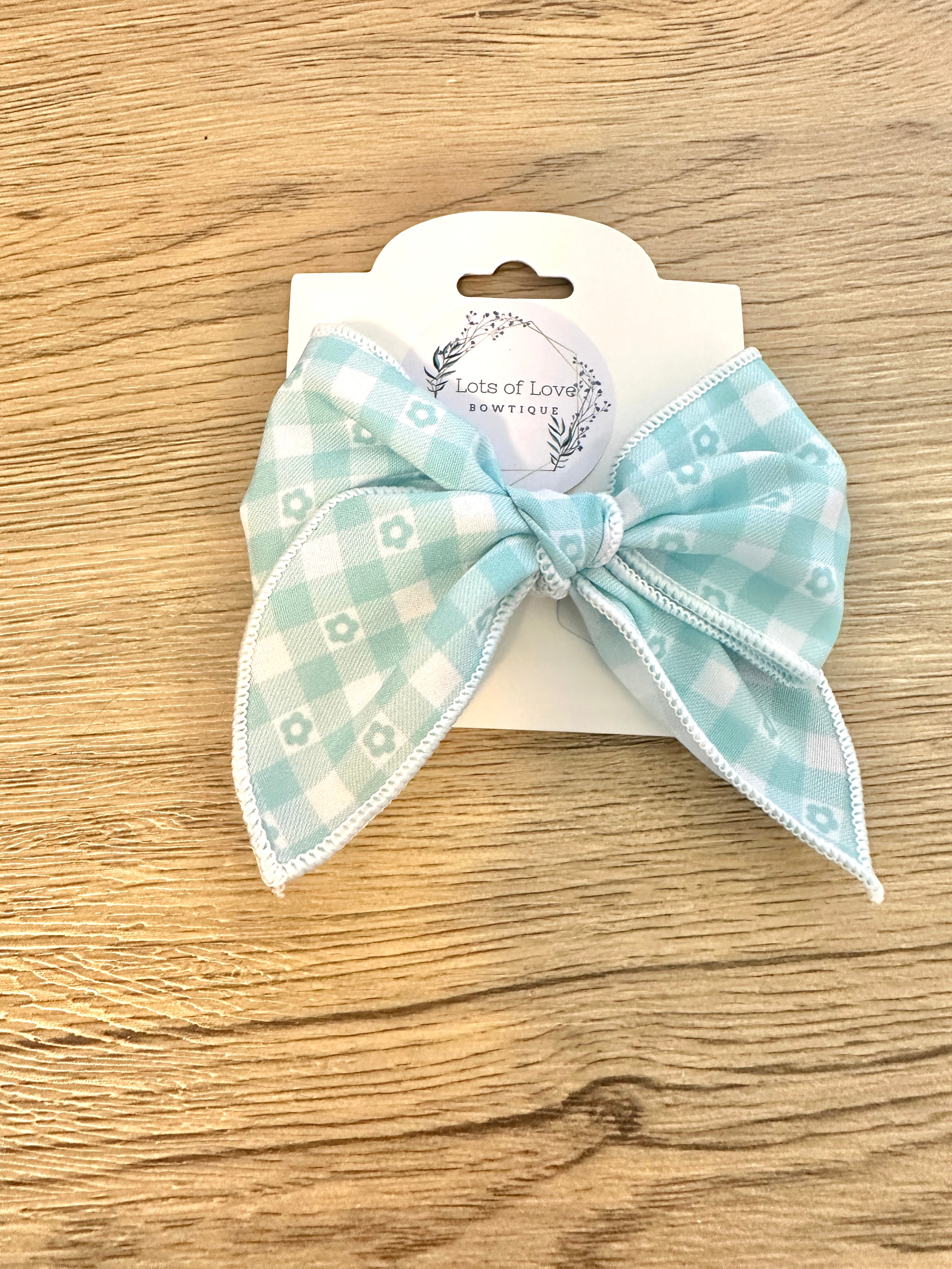 Aqua Plaid Daisy Hand Tied Bow
