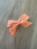 Orange and White Glitter Blakley Bow