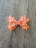 Orange and White glitter Grace Bow