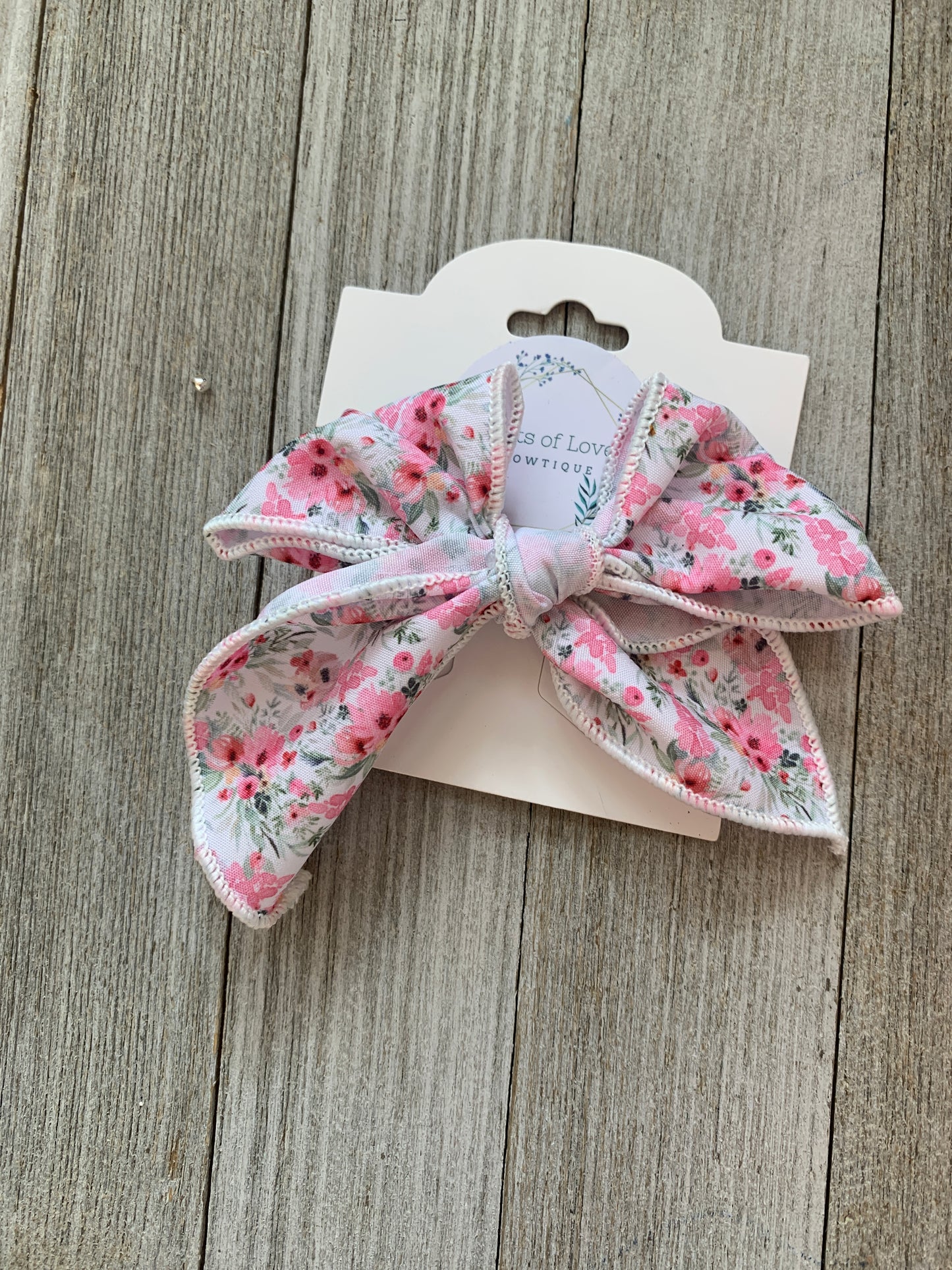 Floral Surged Edge Bow