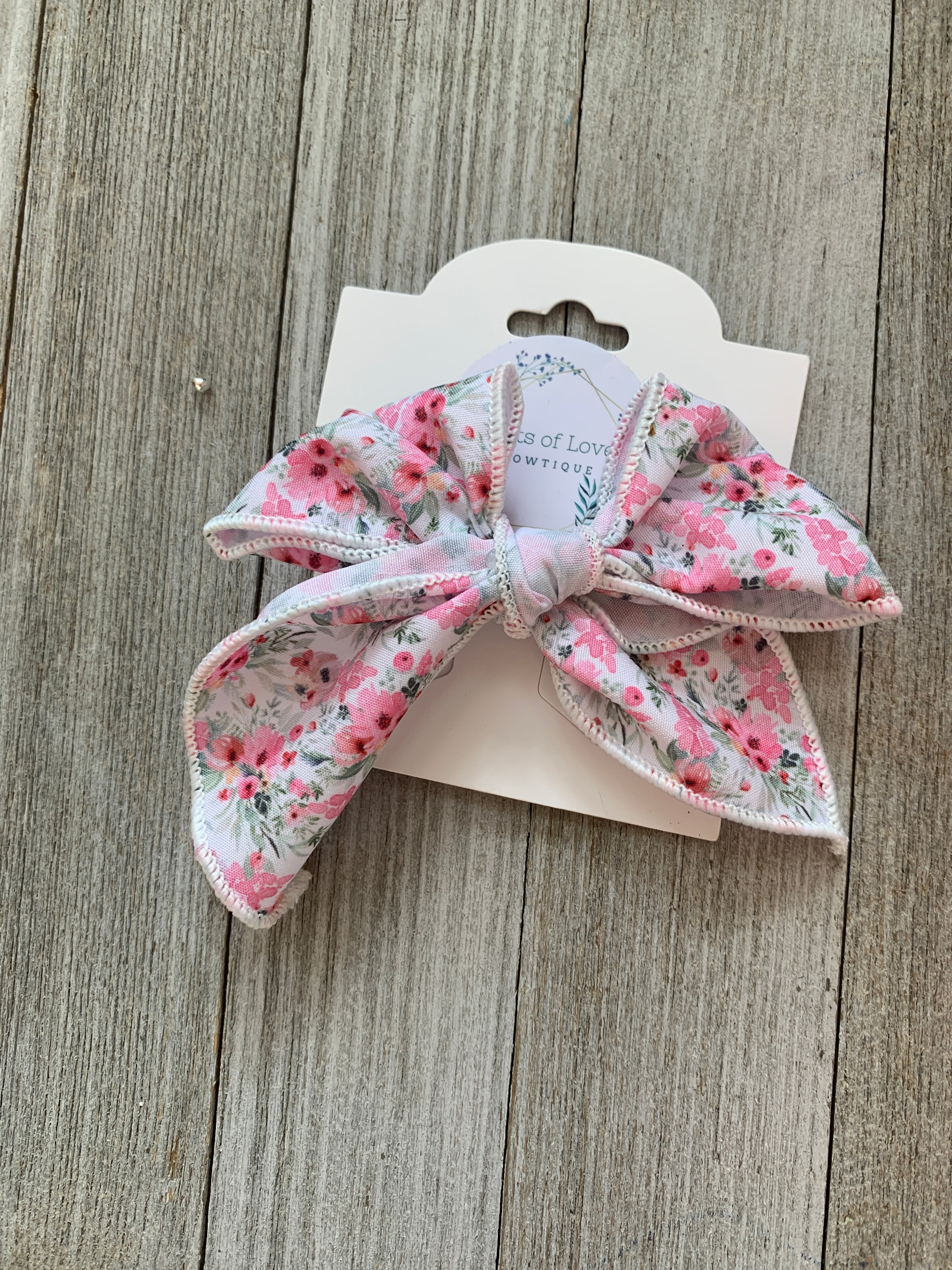 Floral Surged Edge Bow