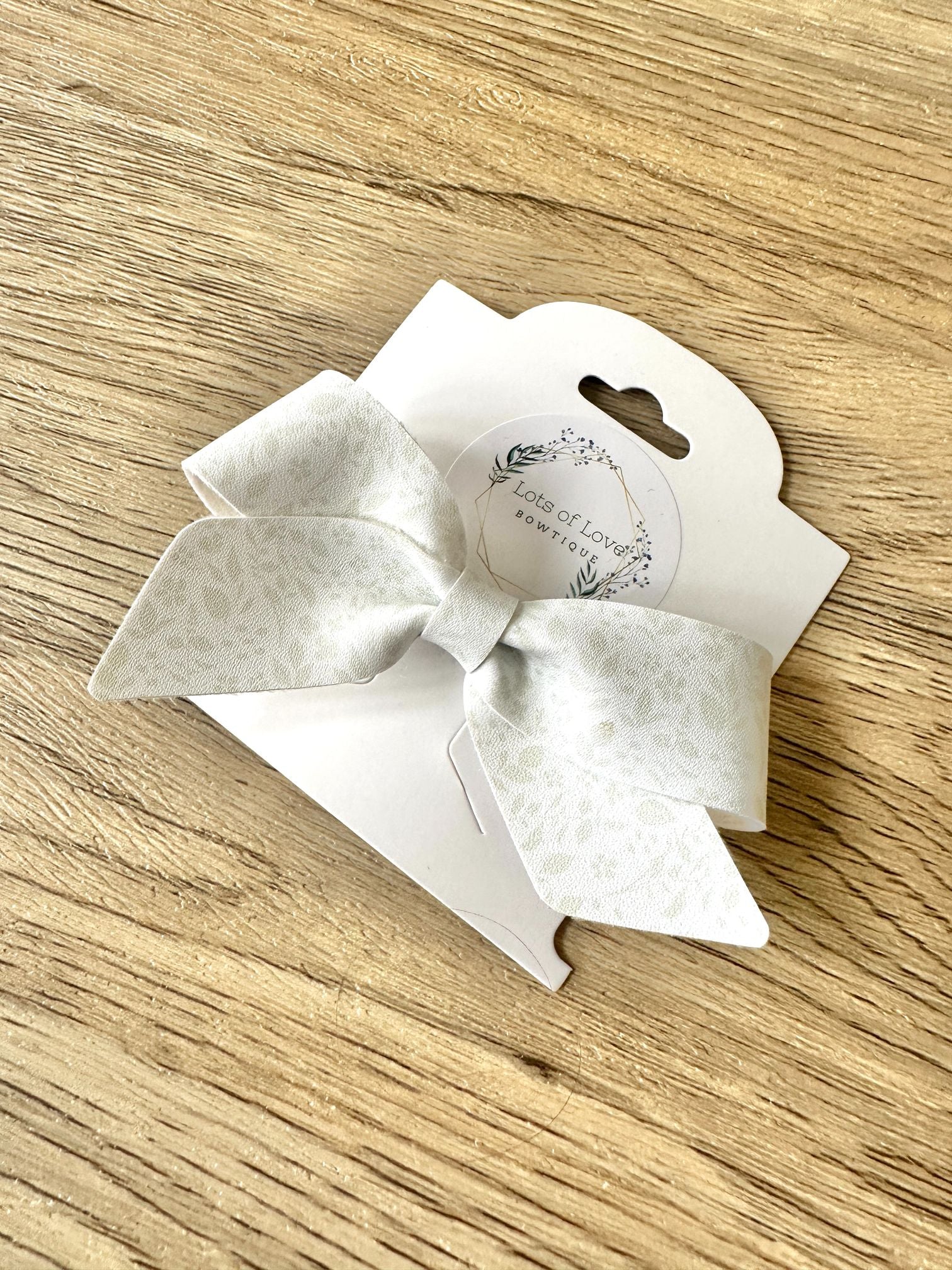 White with Light Sage Leaves