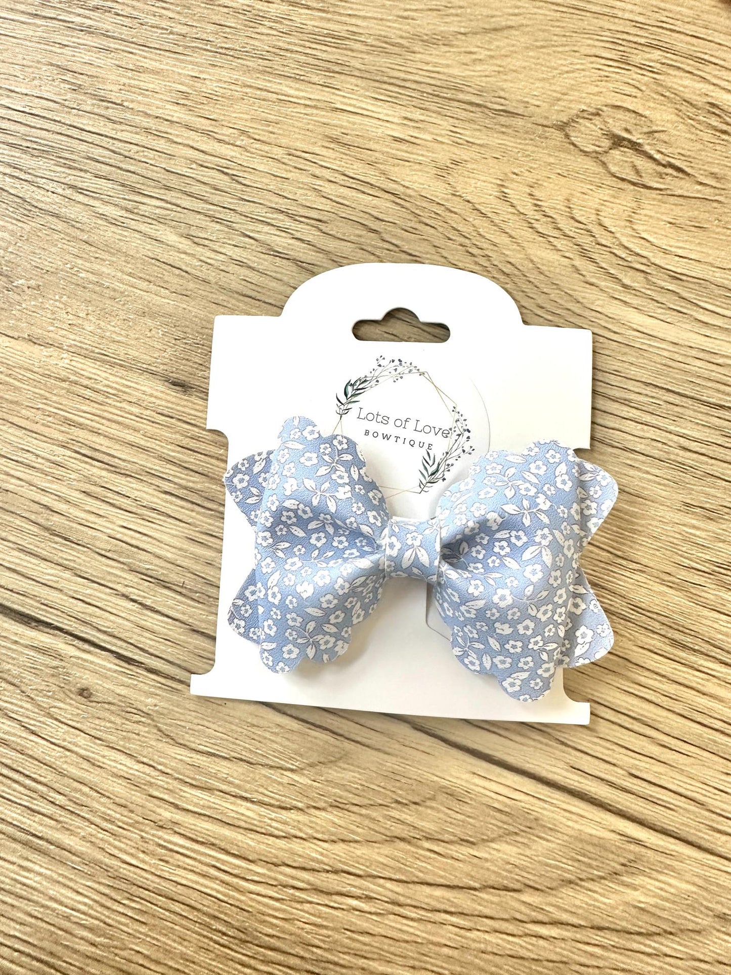 Small White Daisy on Blue Grace Bow